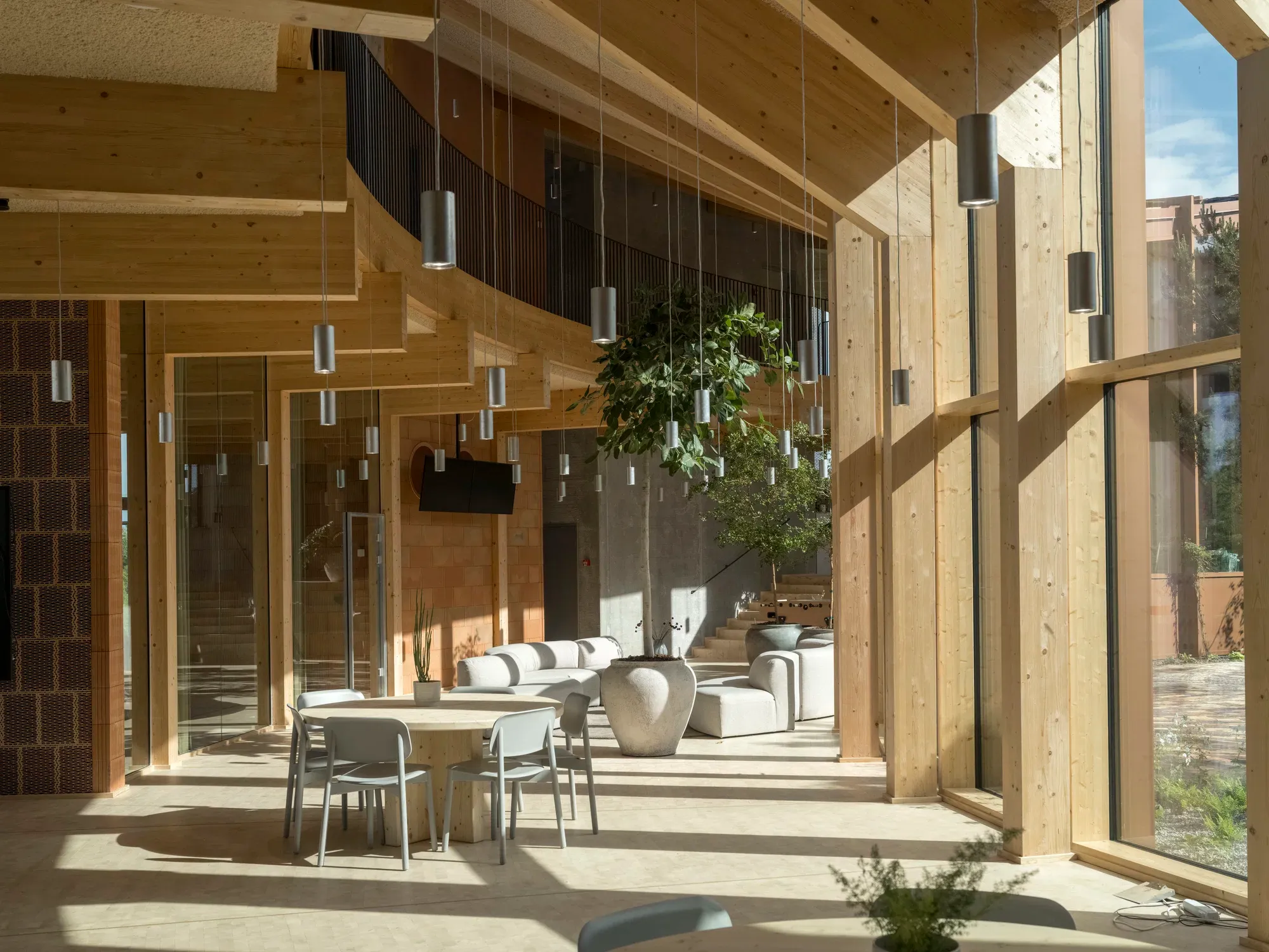 BIG Designs Dymak’s Circular Headquarters as a Living Showcase of Sustainable Materials