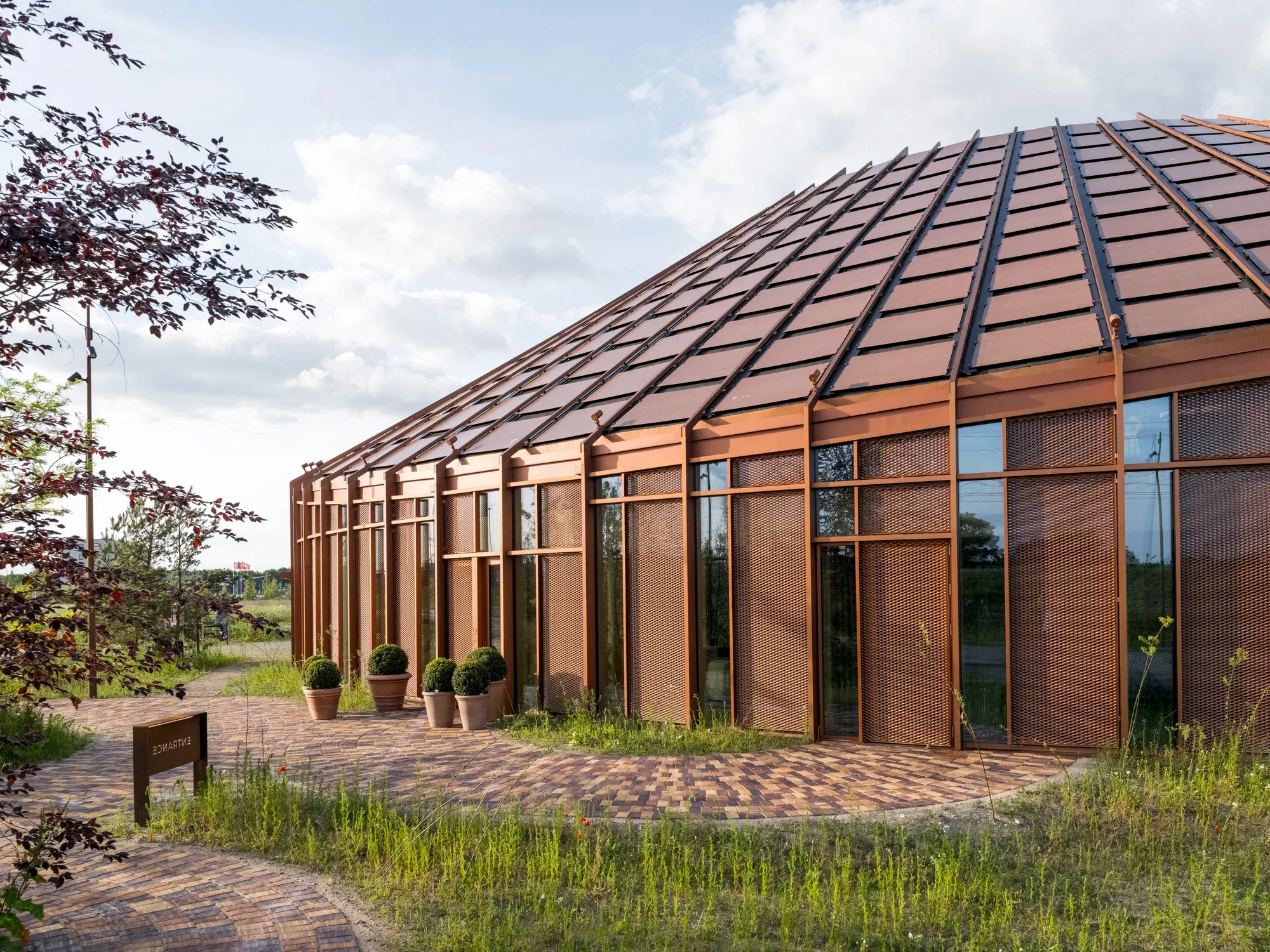 BIG Designs Dymak’s Circular Headquarters as a Living Showcase of Sustainable Materials