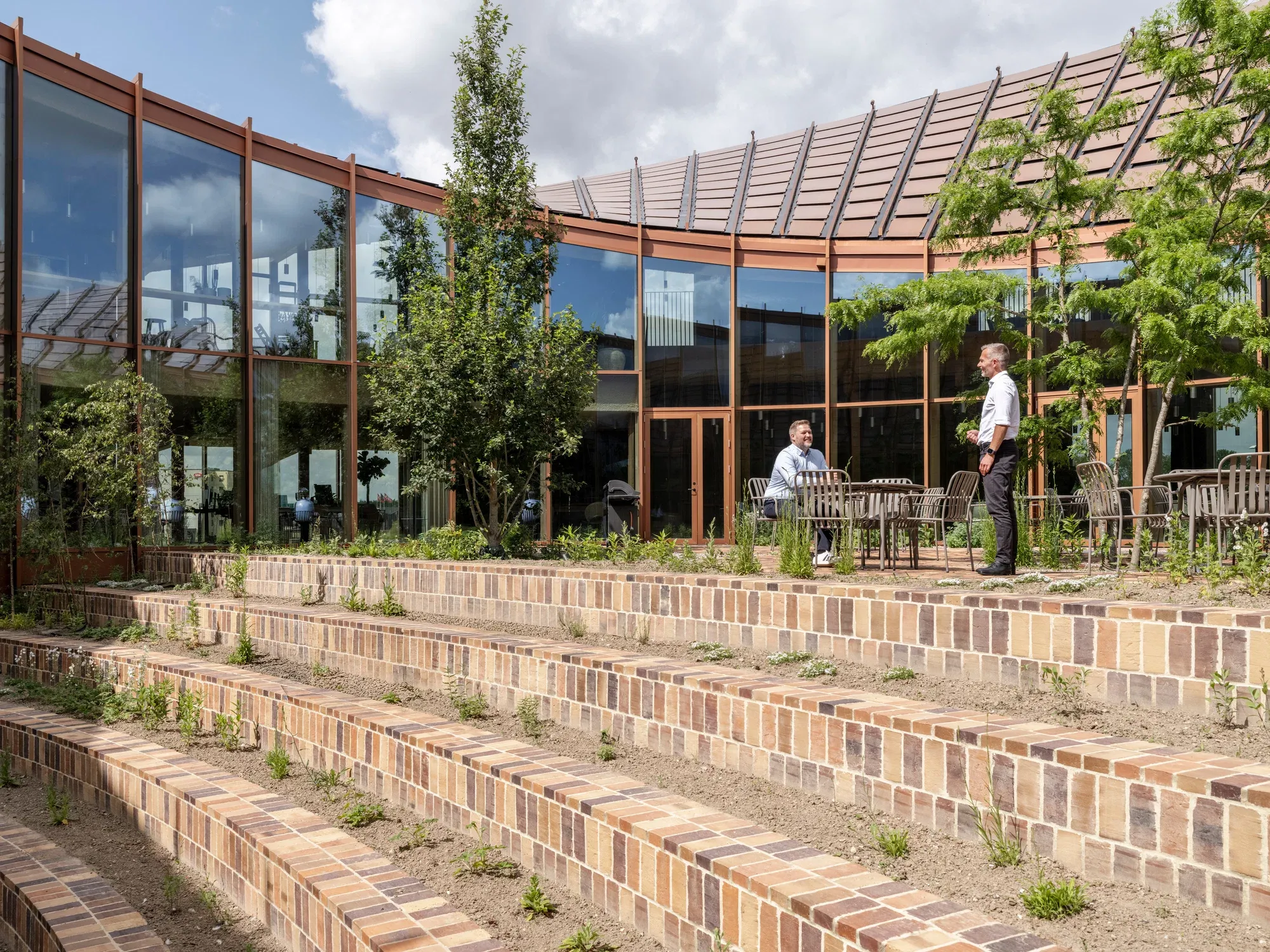 BIG Designs Dymak’s Circular Headquarters as a Living Showcase of Sustainable Materials